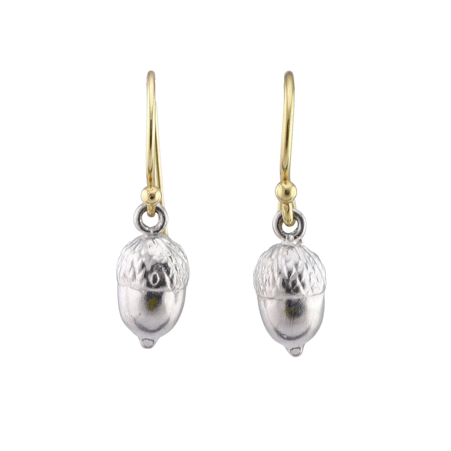 Front-facing view of small acorn earrings in sterling silver by Betsy Barron