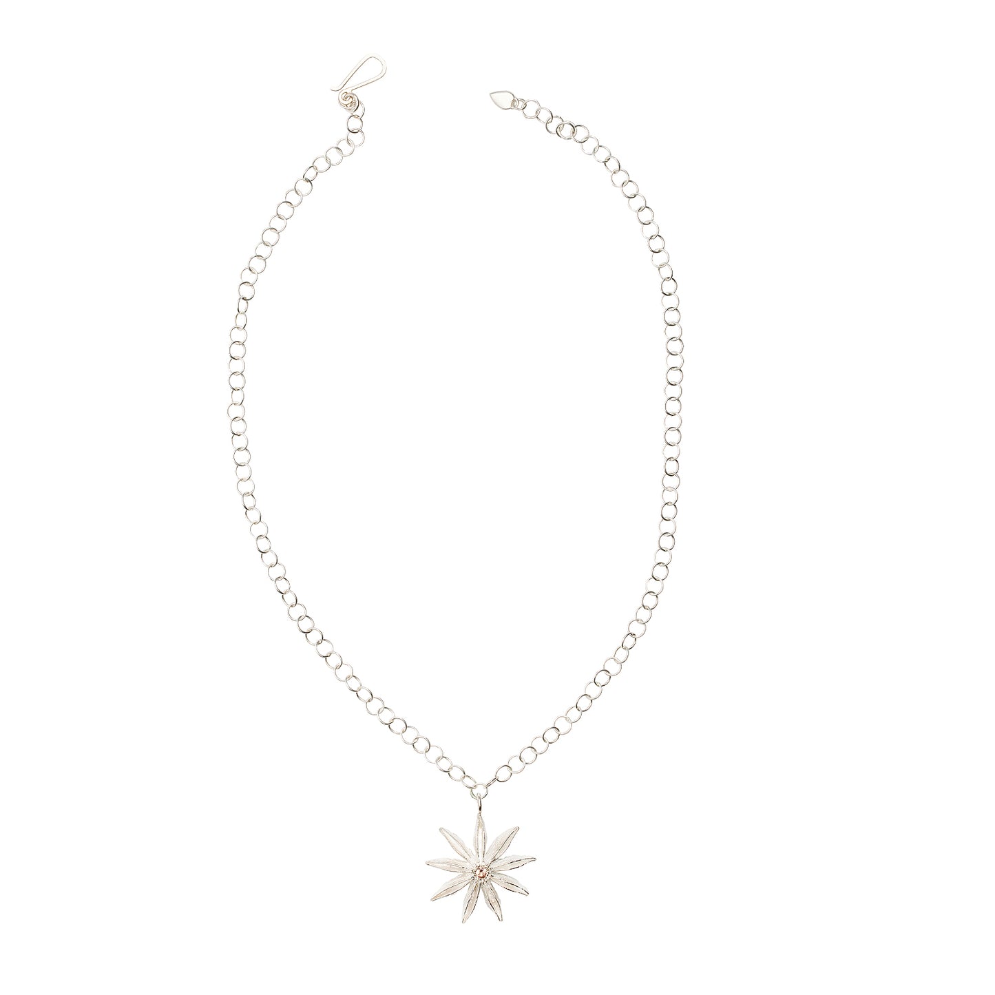Top-down view of sterling silver Star Anise Necklace with citrine gemstone