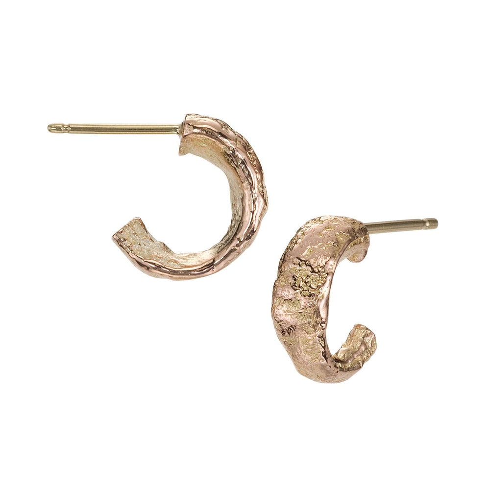 
                      
                        Angled view of Small Molten Hoop in 14k rose gold, by Betsy Barron Jewellery
                      
                    