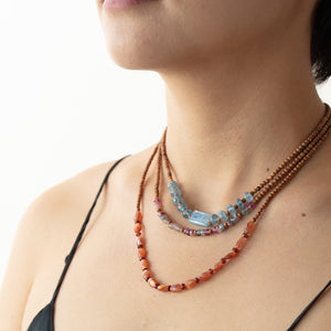 Model wearing Vacation necklaces
