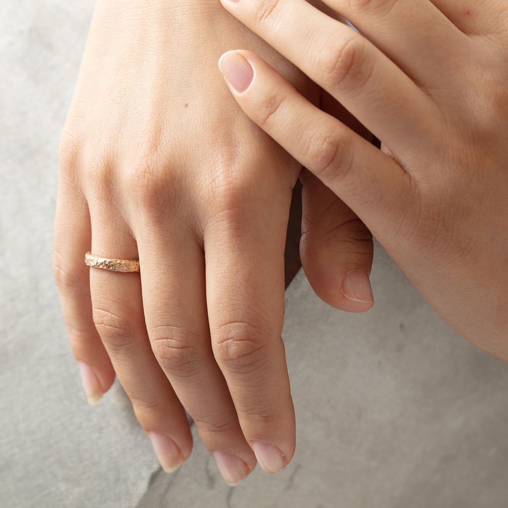 Model wearing Narrow Lava Band on right hand
