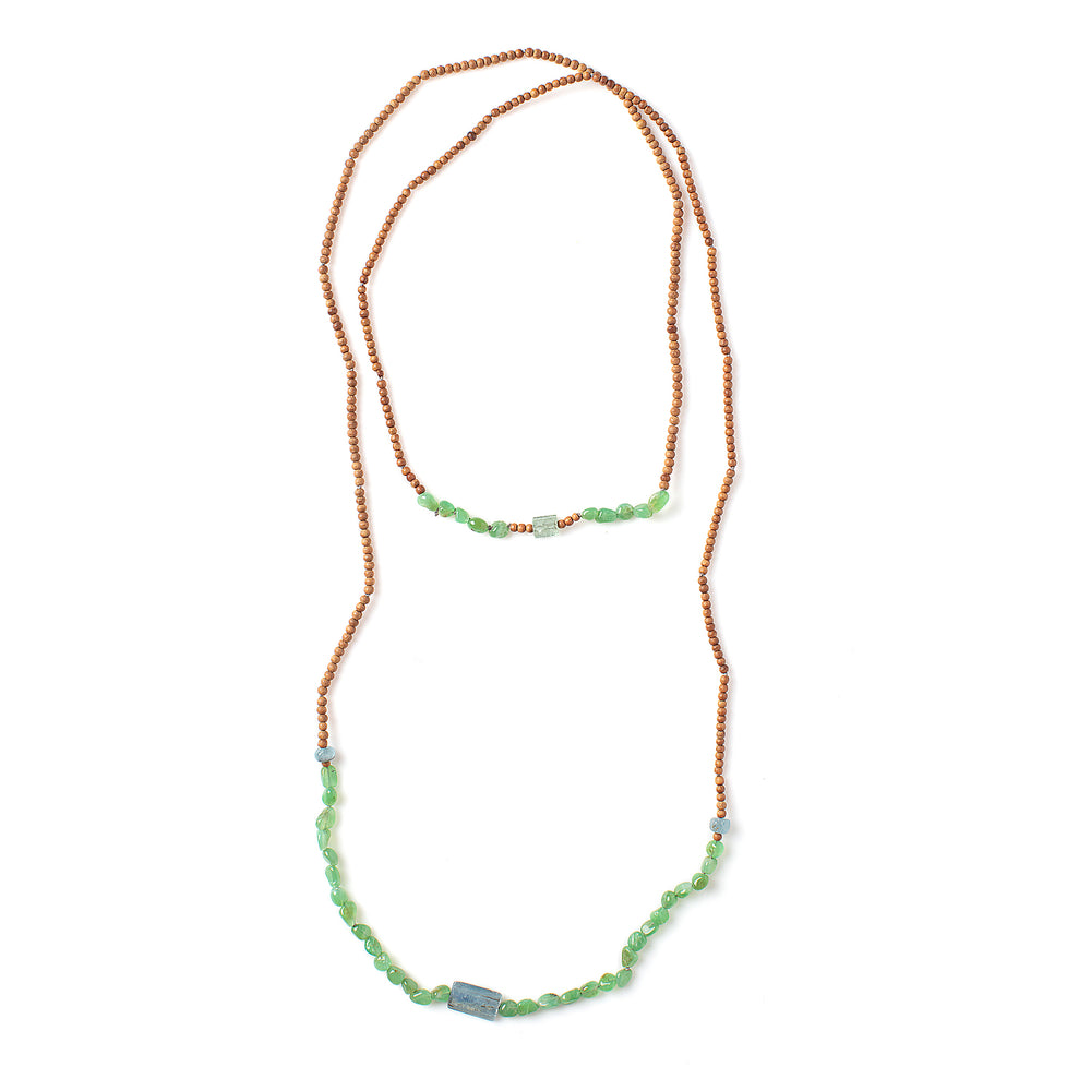 
                      
                        Top-down view of Vacation Necklace with pebble green garnets
                      
                    