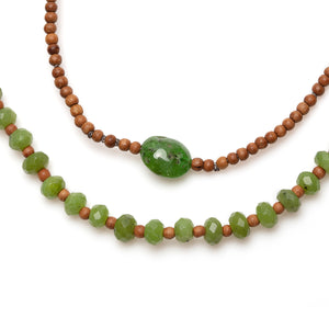 Detail view of Vacation Necklace with jade green garnets